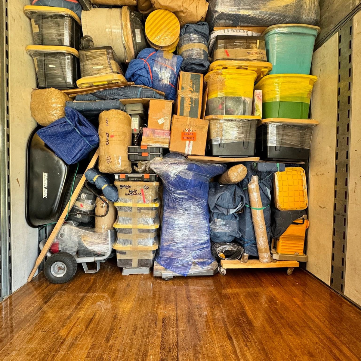 Fully loaded moving truck packed floor to ceiling
