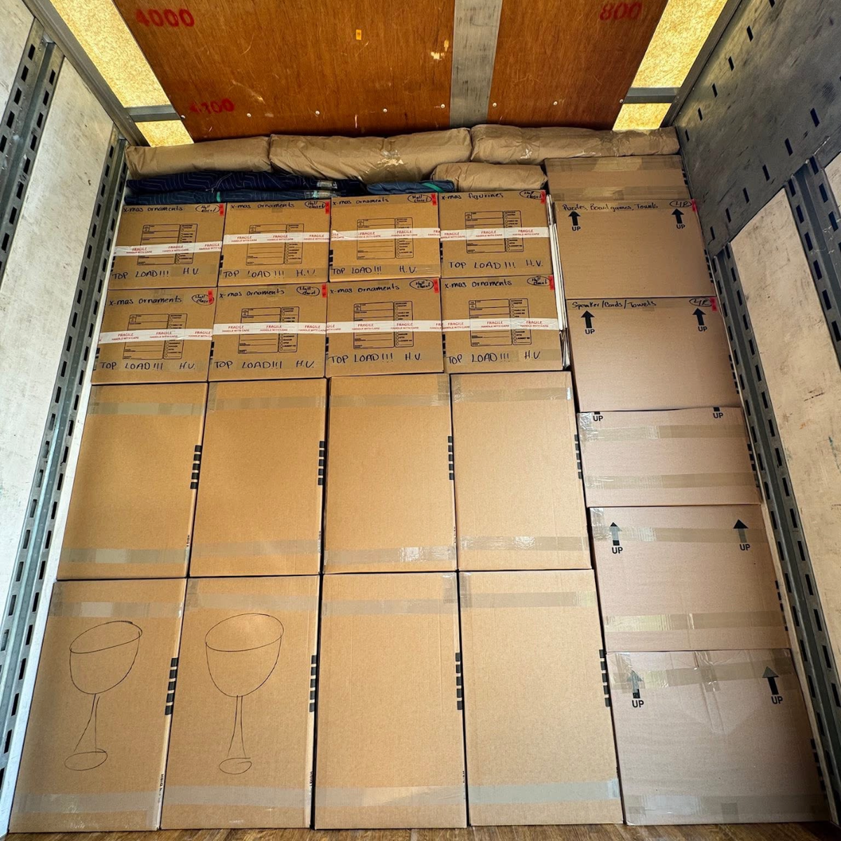 Neatly organized fragile boxes in truck